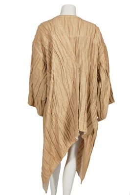 Lot 144 - An Issey Miyake crinkle textured tan linen coat, Autumn-Winter 1984-85