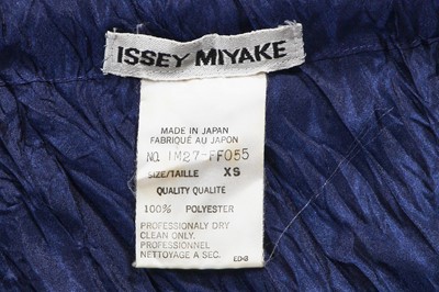 Lot 145 - An Issey Miyake navy blue crinkled polyester ensemble, Spring-Summer 1992