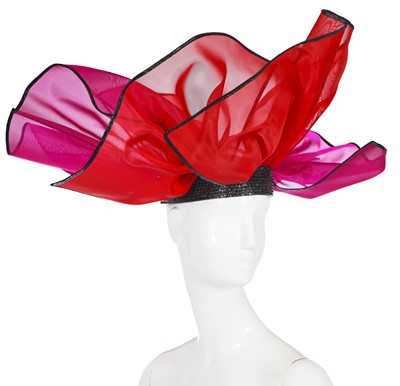 Lot 167 - An Yves Saint Laurent purple and red mesh petal hat, Spring-Summer 1990