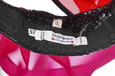 Lot 167 - An Yves Saint Laurent purple and red mesh petal hat, Spring-Summer 1990