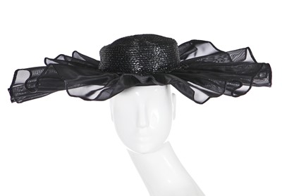 Lot 168 - An Yves Saint Laurent black wide-brimmed hat, Spring-Summer 1990