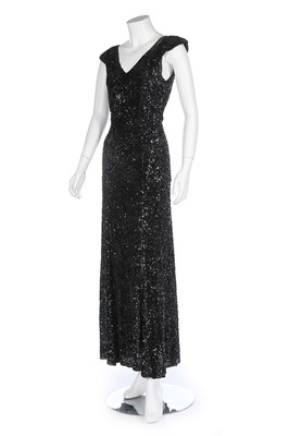 Lot 83 - A bias-cut fully sequinned evening gown, 1930s,...
