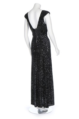 Lot 83 - A bias-cut fully sequinned evening gown, 1930s,...