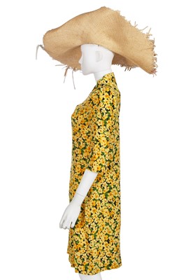 Lot 173 - An Yves Saint Laurent daffodil-print silk dress and straw hat, Spring-Summer 1992