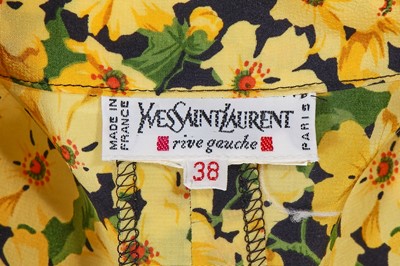 Lot 173 - An Yves Saint Laurent daffodil-print silk dress and straw hat, Spring-Summer 1992