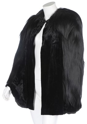 Lot 84 - A Julia Dubois black velvet evening cape...