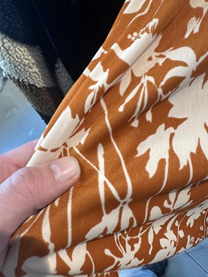 Lot 108 - A Biba brown and white floral printed nylon jersey smock top, circa 1973