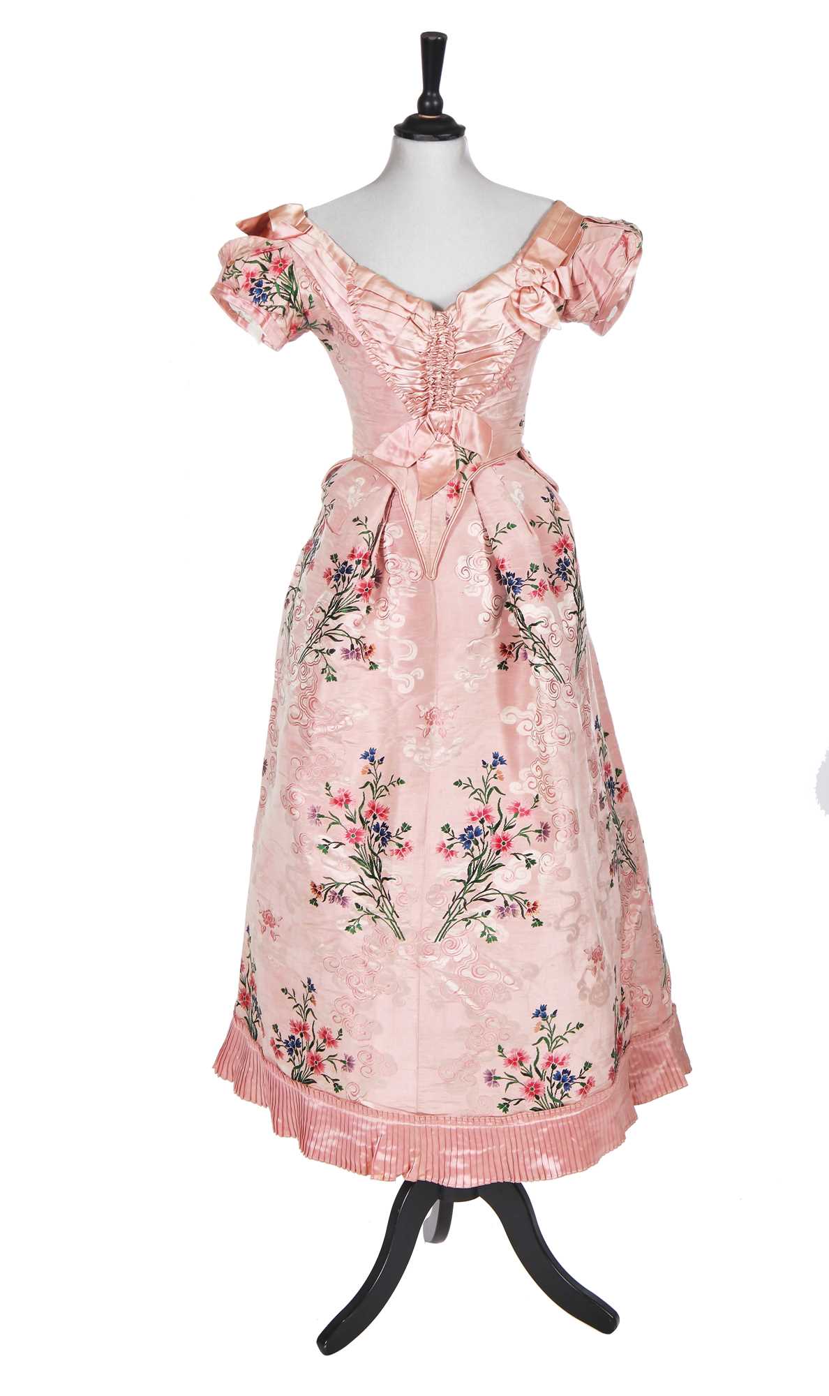 Lot 496 - A group of dressses and skirts, some incorporating earlier fabrics, 1885-1900
