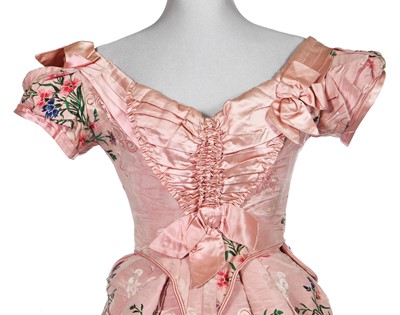 Lot 496 - A group of dressses and skirts, some incorporating earlier fabrics, 1885-1900