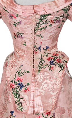 Lot 496 - A group of dressses and skirts, some incorporating earlier fabrics, 1885-1900