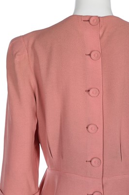 Lot 86 - A pink crêpe ensemble embellished with...