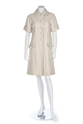 Lot 91 - A Pierre Cardin cream leather coat-dress, late...