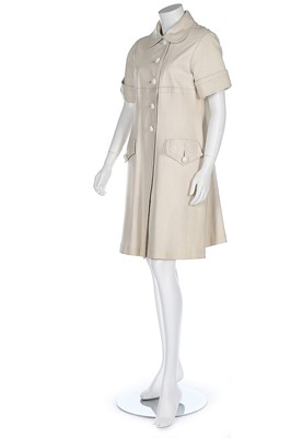 Lot 91 - A Pierre Cardin cream leather coat-dress, late...