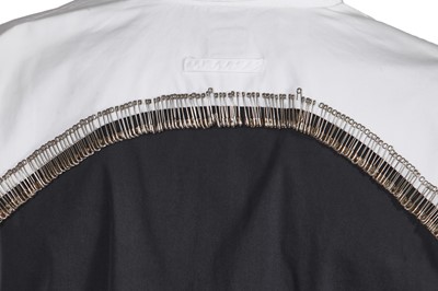 Lot 98 - A group of Jean Paul Gaultier men's tops, 1990s-2000s