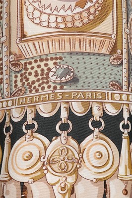 Lot 92 - An Hermès reversible printed silk and wool...