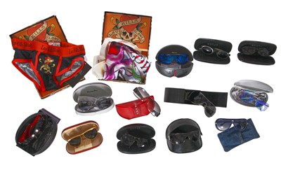 Lot 35 - A large group of men's sunglasses and accessories, mostly 2000s