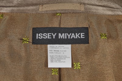 Lot 60 - A group of Issey Miyake men's suits, shirts and accessories, 2000s