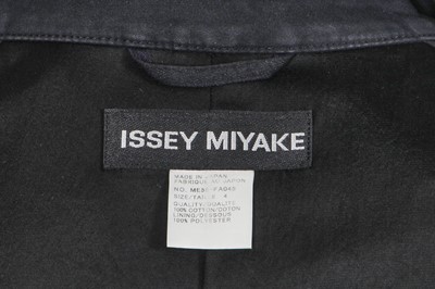 Lot 61 - A group of Issey Miyake men's coats, suits, shirts and accessories, 2000s