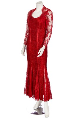 Lot 174 - A Loris Azarro red fringed evening gown, 1990s-2000s