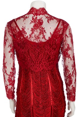Lot 174 - A Loris Azarro red fringed evening gown, 1990s-2000s
