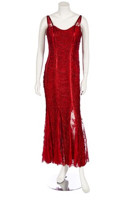 Lot 174 - A Loris Azarro red fringed evening gown, 1990s-2000s
