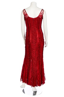 Lot 174 - A Loris Azarro red fringed evening gown, 1990s-2000s