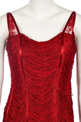Lot 174 - A Loris Azarro red fringed evening gown, 1990s-2000s