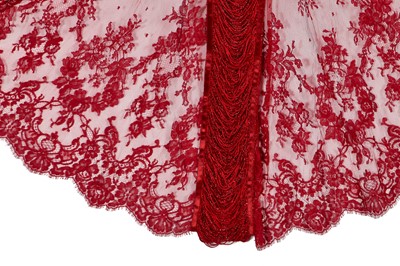 Lot 174 - A Loris Azarro red fringed evening gown, 1990s-2000s