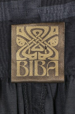 Lot 432 - A group of black evening garments, 1970s