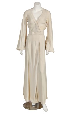 Lot 411 - An Ossie Clark ivory moss crêpe 'Cuddly' wrap-over dress, mid 1970s