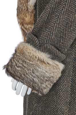 Lot 122 - A Hardy Amies men's grey and green wool and coyote fur coat, 1990s-2000s