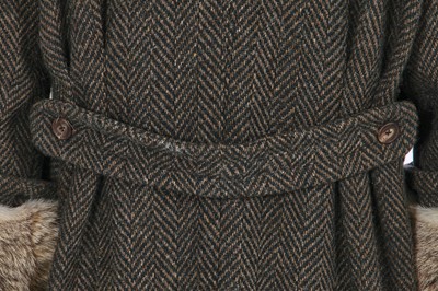 Lot 122 - A Hardy Amies men's grey and green wool and coyote fur coat, 1990s-2000s