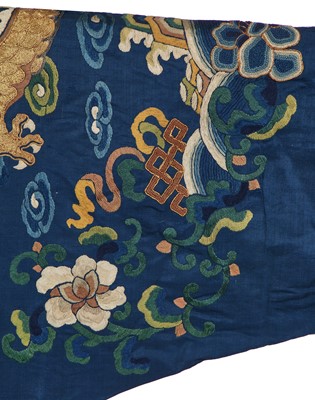 Lot 535 - A couched blue silk gauze 'dragon' robe, jifu/longpao, Chinese, late 19th-century