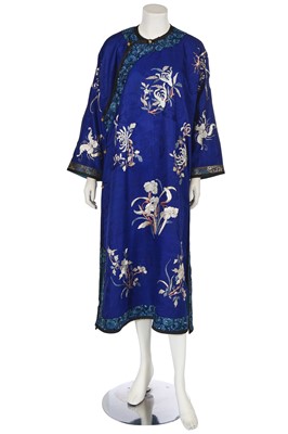 Lot 539 - A woman's embroidered damask blue ground informal robe, chang-fu, Chinese, circa 1910