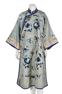 Lot 540 - A woman's embroidered damask pale blue ground informal robe, chang-fu, Chinese, late 19th-century