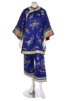 Lot 542 - A Han woman's embroidered blue satin ground jacket, ao, and trousers, ku, early 20th-century