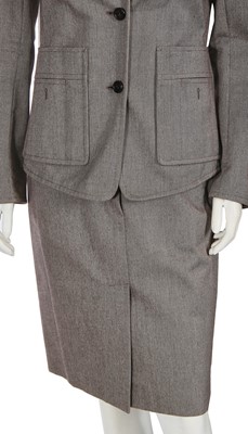 Lot 170 - A group of Yves Saint Laurent suits and dresses, 1990s-early 2000s