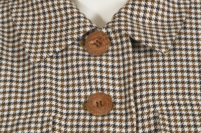 Lot 170 - A group of Yves Saint Laurent suits and dresses, 1990s-early 2000s