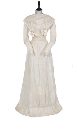 Lot 487 - A Madame E Yost white cotton organdie lawn dress, circa 1910