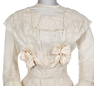 Lot 487 - A Madame E Yost white cotton organdie lawn dress, circa 1910