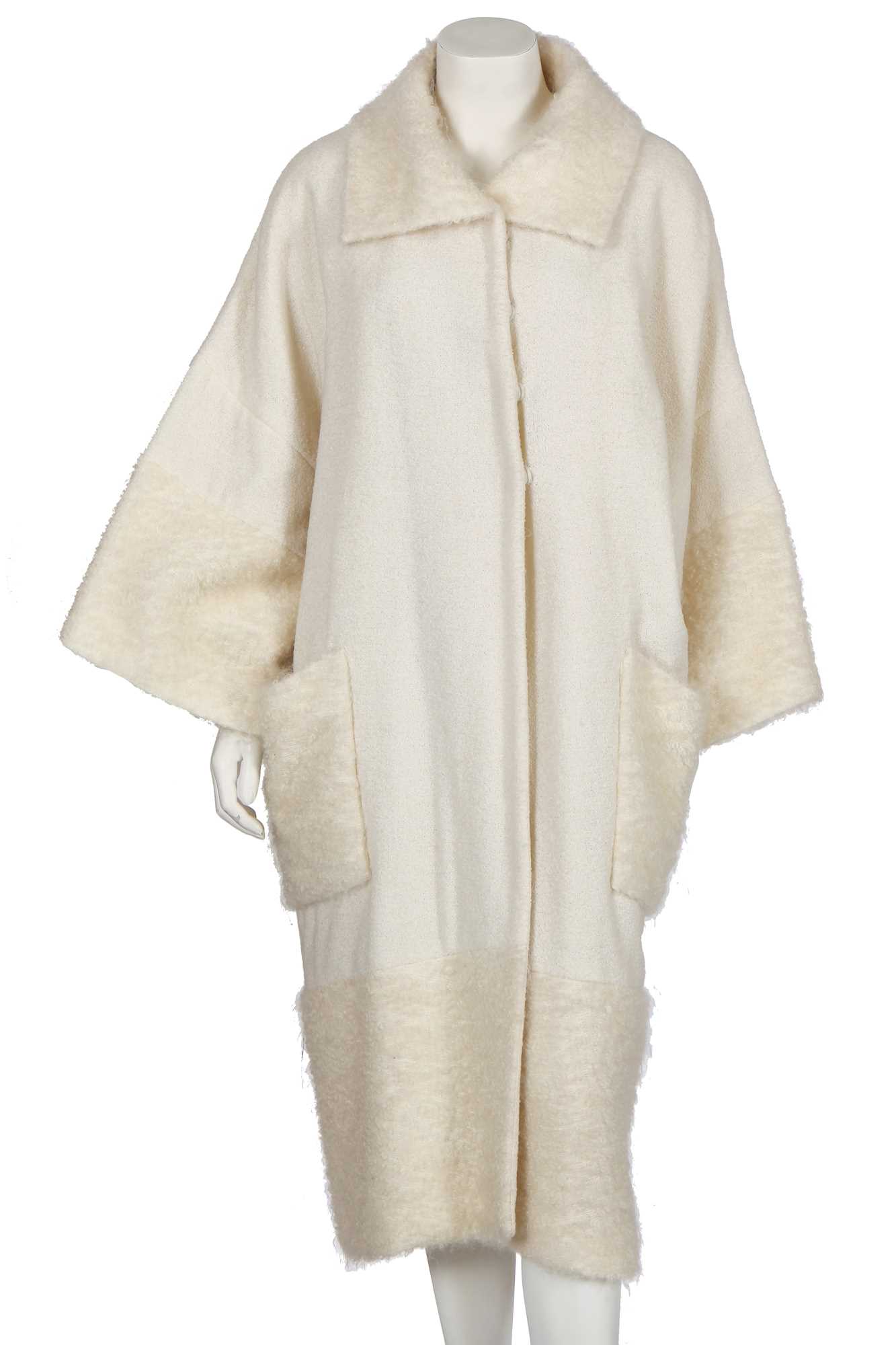 Lot 200 - A Christian Dior by John Galliano ivory bouclé wool coat, circa 1999