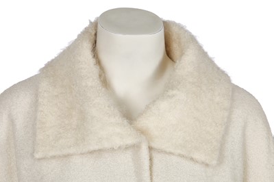 Lot 200 - A Christian Dior by John Galliano ivory bouclé wool coat, circa 1999