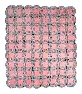 Lot 444 - A 'double wedding ring' patchwork quilt,...