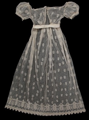 Lot 506 - An embroidered tulle bridal or evening gown, circa 1820