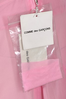 Lot 239 - A Comme des Garçons pink nylon and ivory tulle skirt, 2004