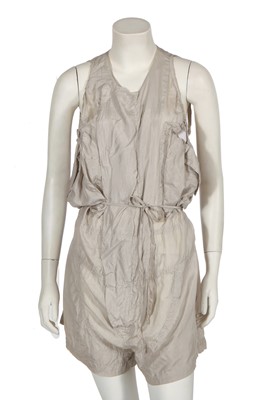 Lot 245 - A Katharine Hamnett grey parachute silk playsuit, 1980s