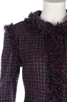 Lot 42 - A Chanel purple tweed suit, Autumn 2003,...