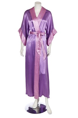 Lot 403 - A Biba purple satin dressing gown, circa 1973