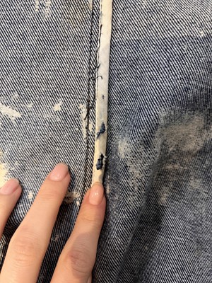 Lot 85 - An Alexander McQueen men's bleached denim coat, 'It's a Jungle Out There' collection, Autumn-Winter 1997-98