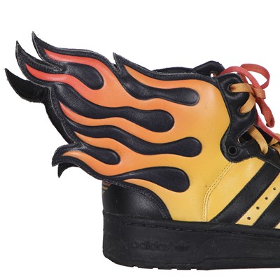 Lot 9 - A pair of Addidas by Jeremy Scott men's flame trainers, 2008